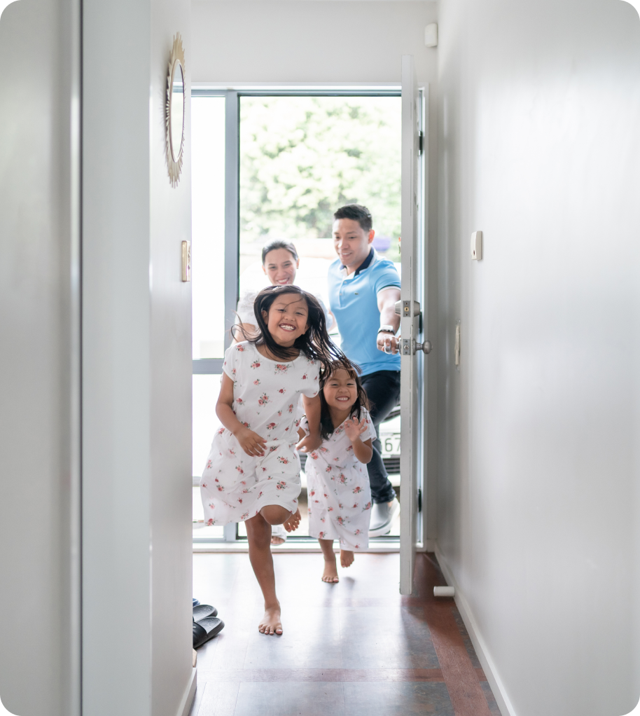Family entering home